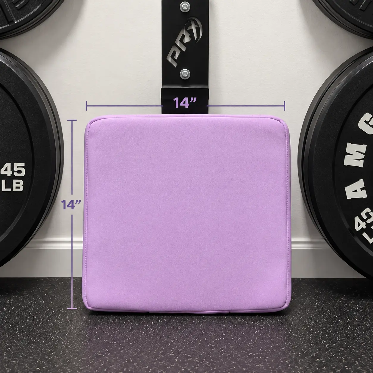 Lavender HIPHUG foam pad with 14 x 14 inch dimension labels, leaning on a PRx wall mount between weight plates